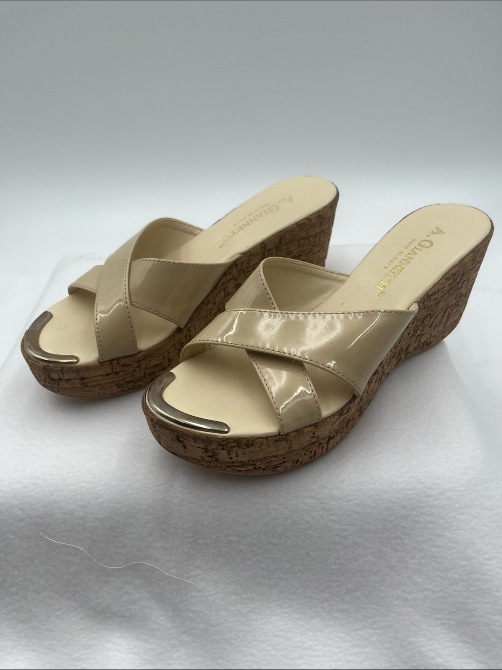 A. Giannetti Cream Patent Leather Cork Wedge Sandals